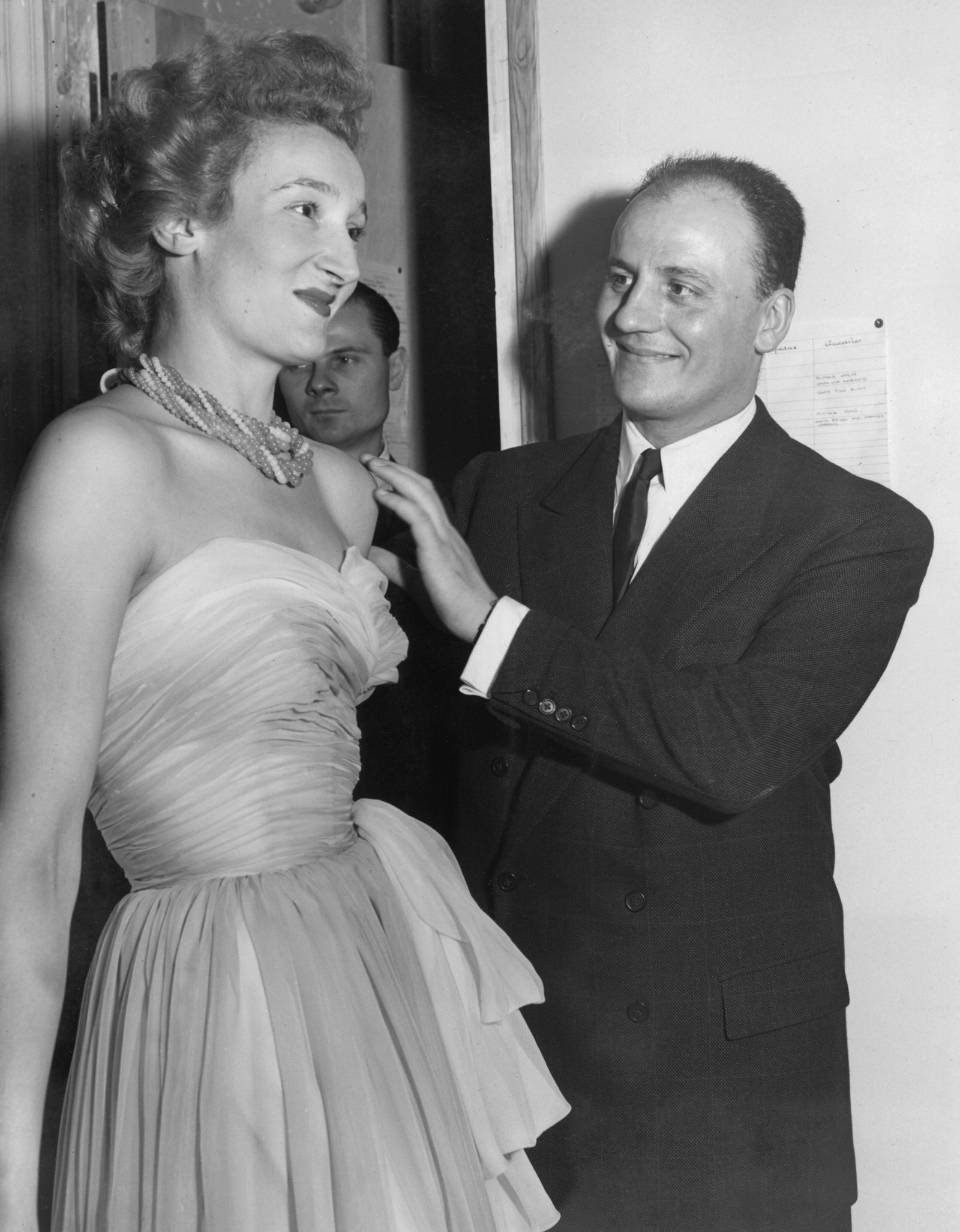 Image may contain Orane Demazis Pierre Balmain Clothing Formal Wear Suit Dress Accessories Jewelry and Necklace