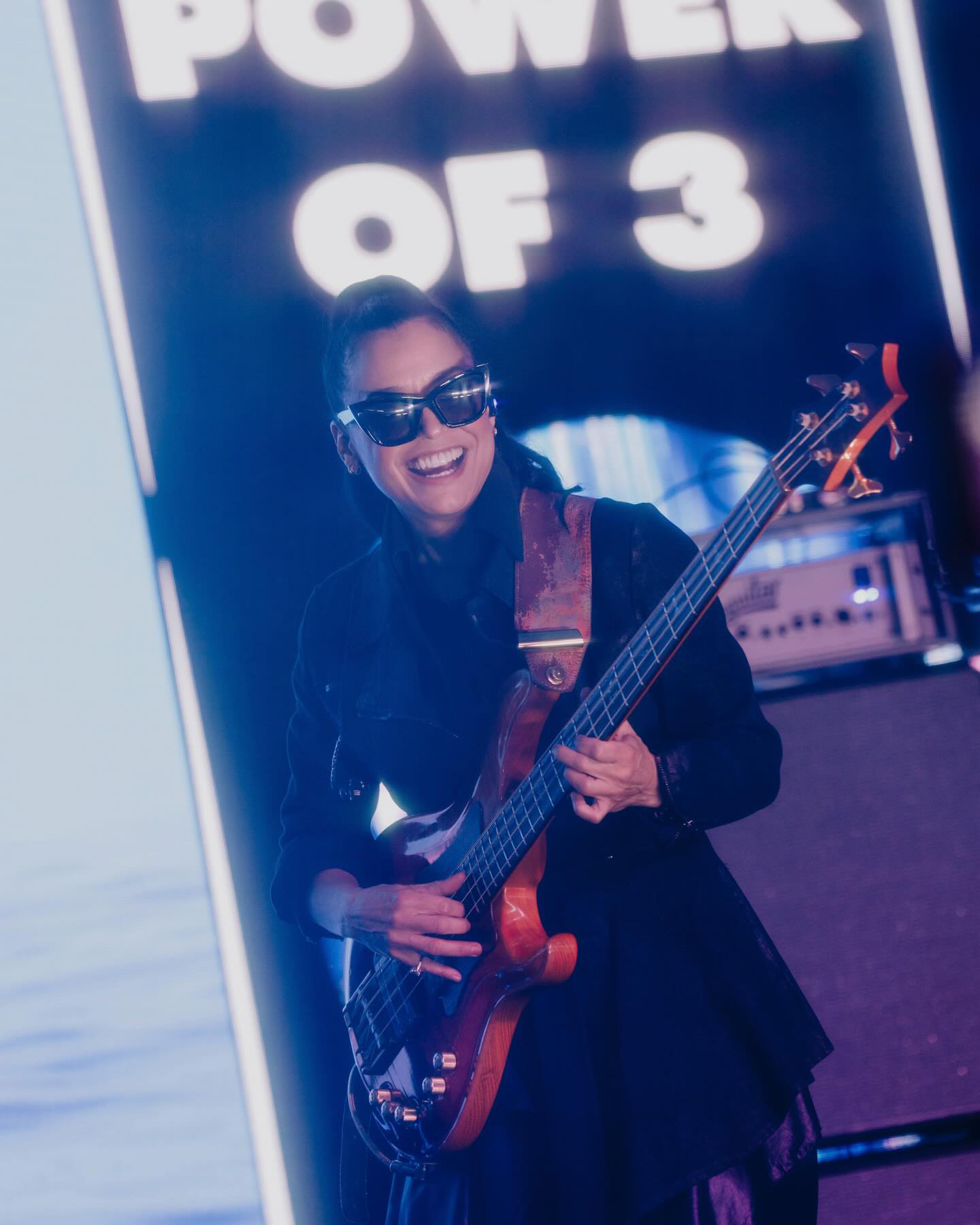 Rhonda Smith playing bass on stage